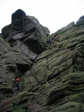 Debra leads an inviting route on Heather Wall...