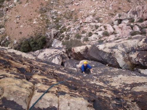 Exiting the chimney at the top of pitch 2.