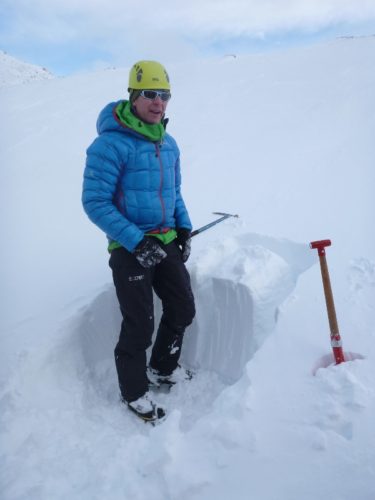 Graeme assessing the snowpack