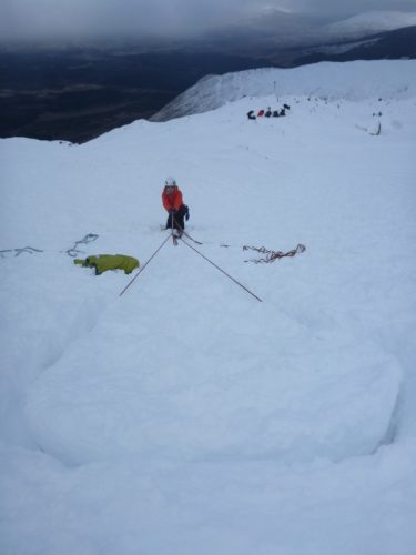 Mike testing his snow bollard - fit for an abseil?